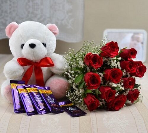 Bunch of 12 Red Roses with Teddy & 5 Dairy Milk Chocolates